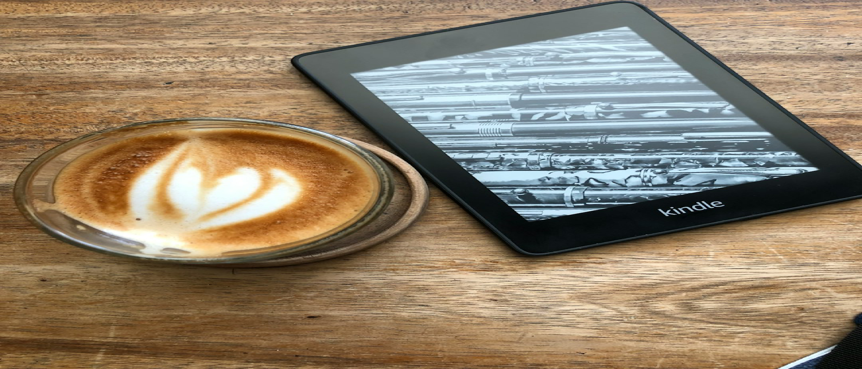 Amazon Redesigns Kindle: Flush Front, Thinner, Lighter