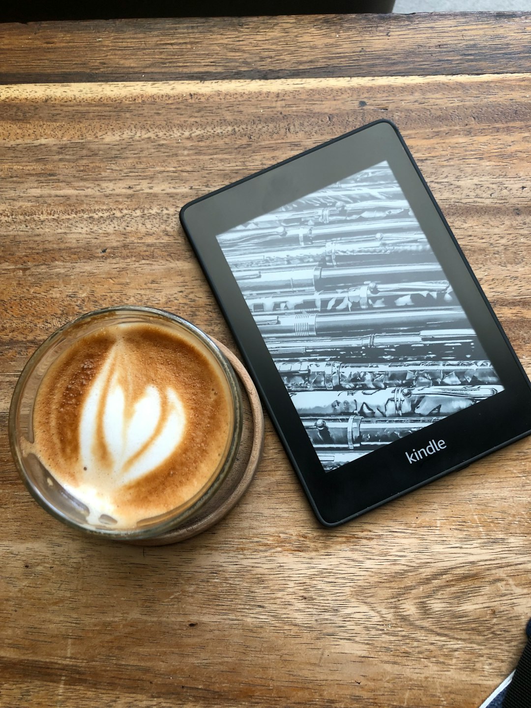 Amazon Redesigns Kindle: Flush Front, Thinner, Lighter